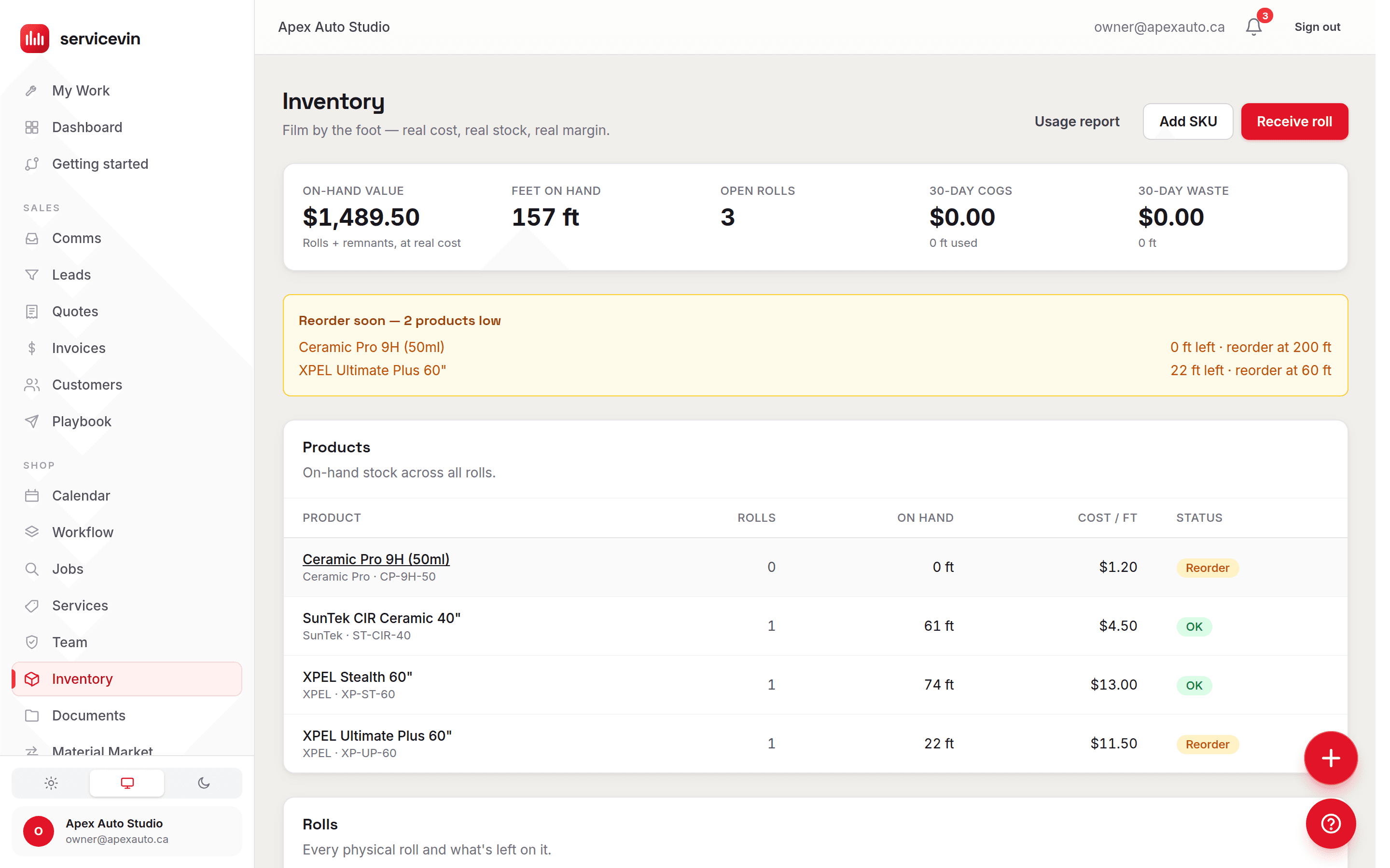 The inventory page tracking vinyl and laminate rolls to the foot with real cost and reorder alerts.